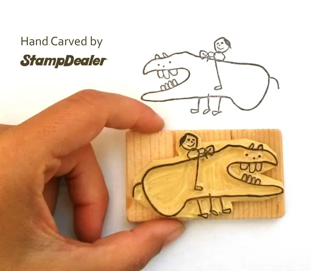 Custom hand-stamp of a child's drawing for his notepad