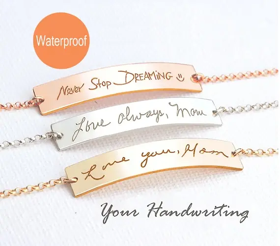 Kids' actual handwriting laser-engraved stainless