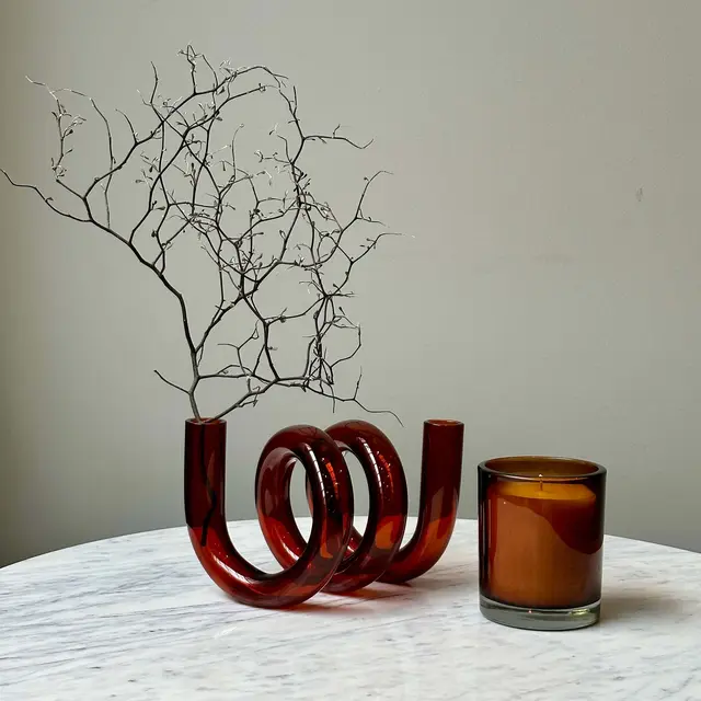 Hand-blown amber curly sculptural glass vase