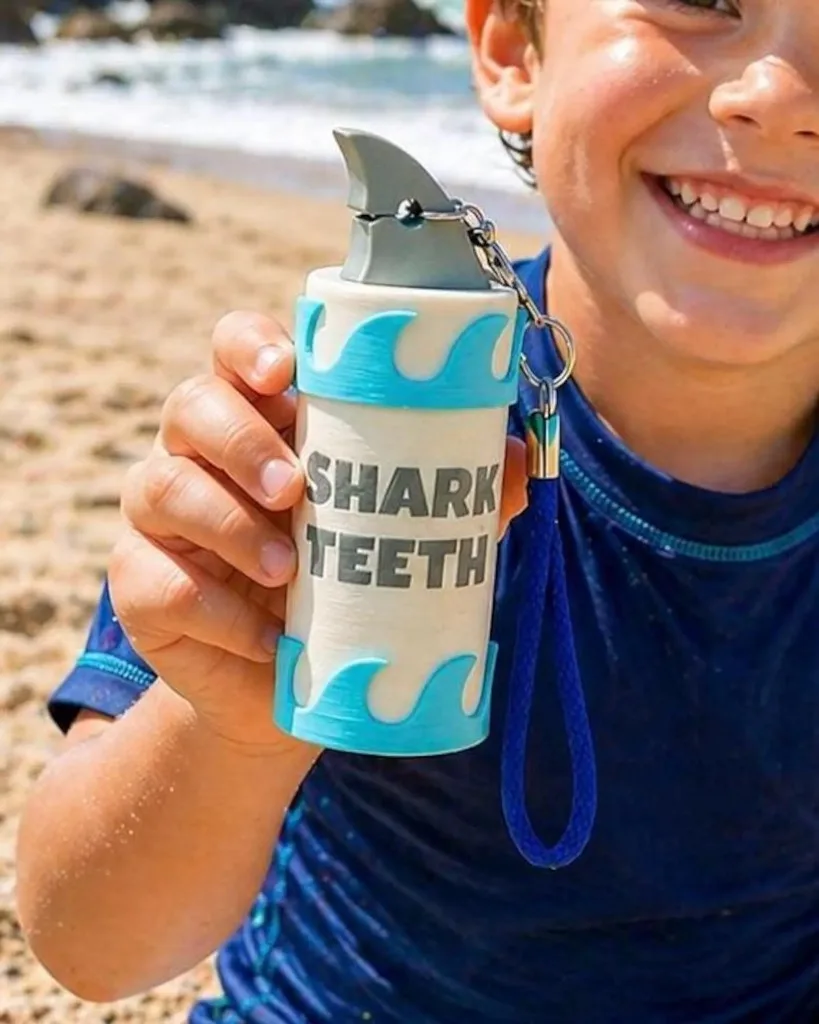Personalized shark tooth holder
