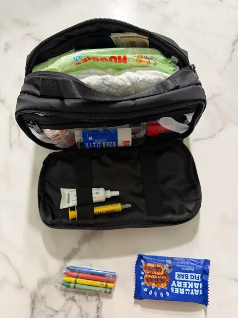 Dry bag packed with dad-only snacks and notes