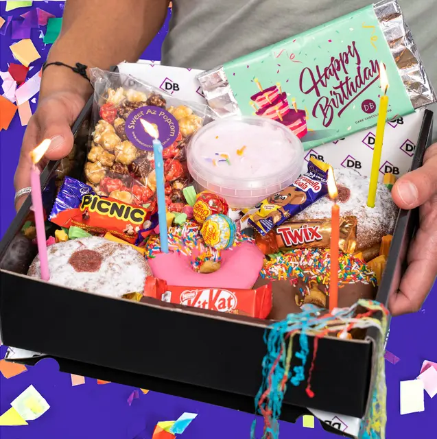 Viral dessert franchise mega-pass with physical reveal wrapper