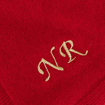 Red cashmere travel wrap with optional 1986 date