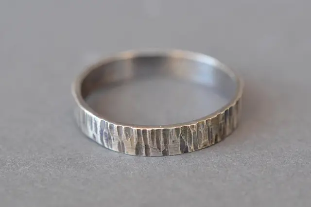 Wood-grain textured sterling silver band